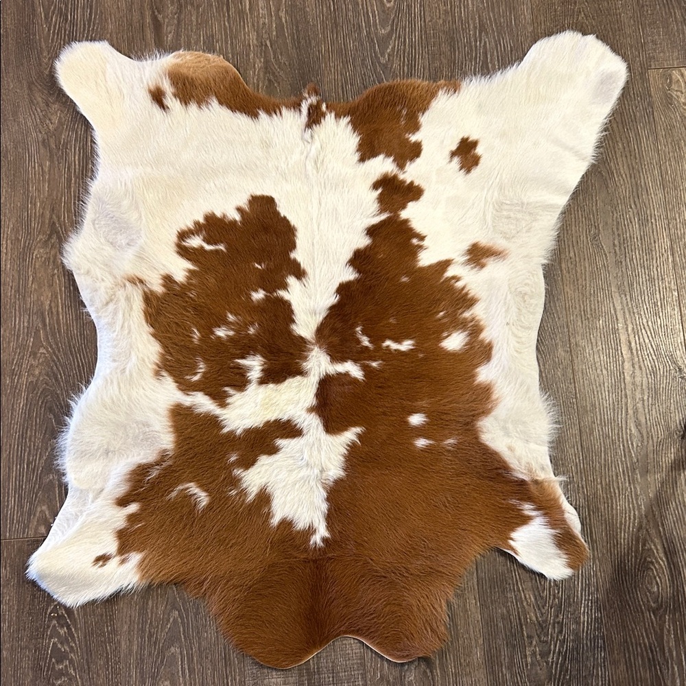 Brown and White Cowhide Rug